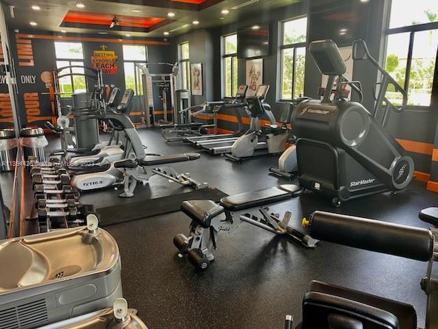 732 Southeast 33 Terrace Homestead, FL 33033 - Photo 64 of 65 a view of a room with gym equipment