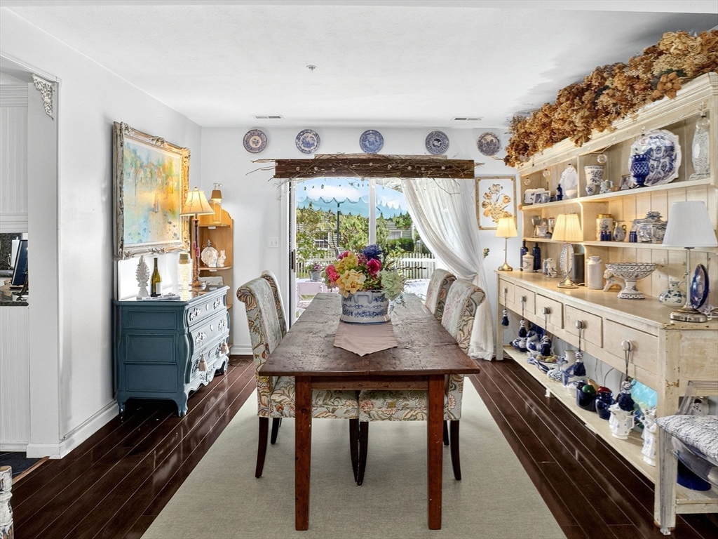 127 Clear Pond Drive, Unit 127 Walpole, MA 02081 - Photo 10 of 38 a view of a dining room with furniture window and outside view