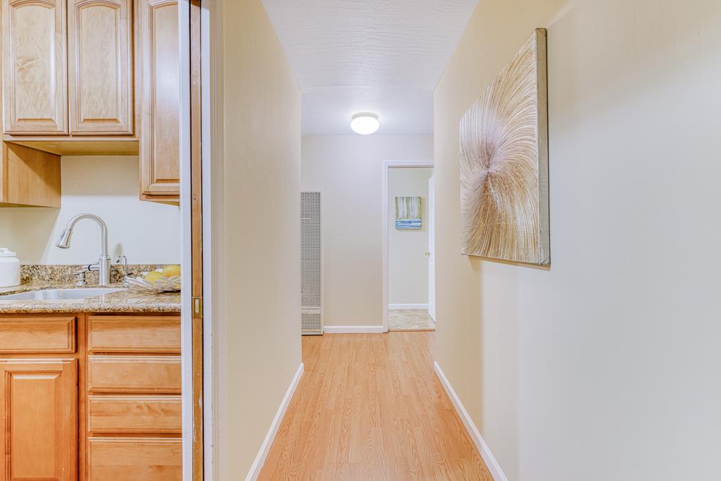 38455 Bronson Street, Unit 322 Fremont, CA 94536 - Photo 13 of 35 a view of a bathroom from a hallway