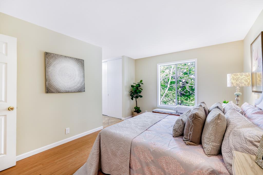 38455 Bronson Street, Unit 322 Fremont, CA 94536 - Photo 15 of 35 a bedroom with a large bed and a window