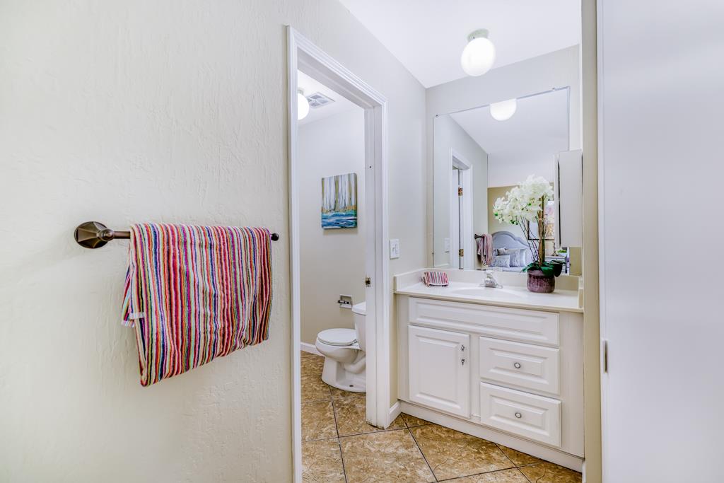 38455 Bronson Street, Unit 322 Fremont, CA 94536 - Photo 20 of 35 a bathroom with a sink a toilet and shower