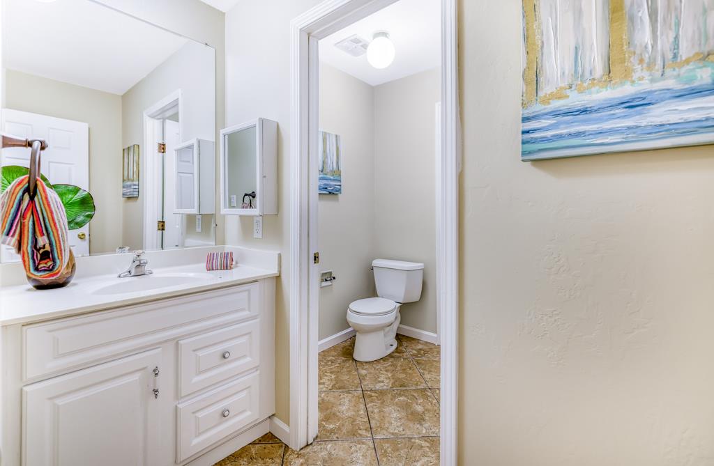 38455 Bronson Street, Unit 322 Fremont, CA 94536 - Photo 22 of 35 a bathroom with a sink a toilet and a shower