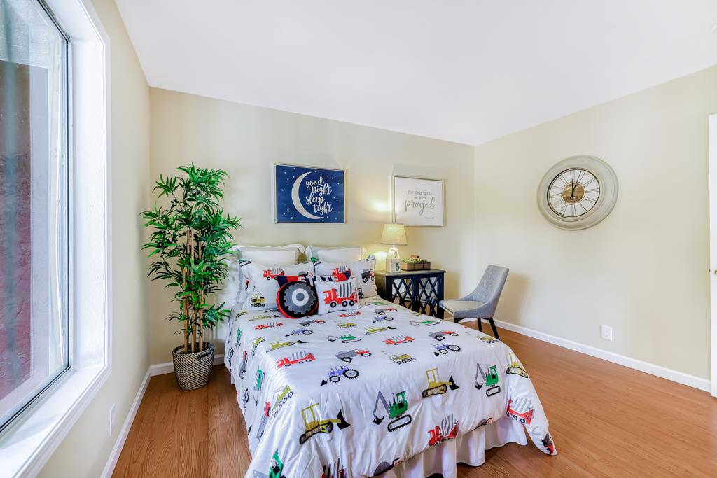 38455 Bronson Street, Unit 322 Fremont, CA 94536 - Photo 24 of 35 a bedroom with bed and a window