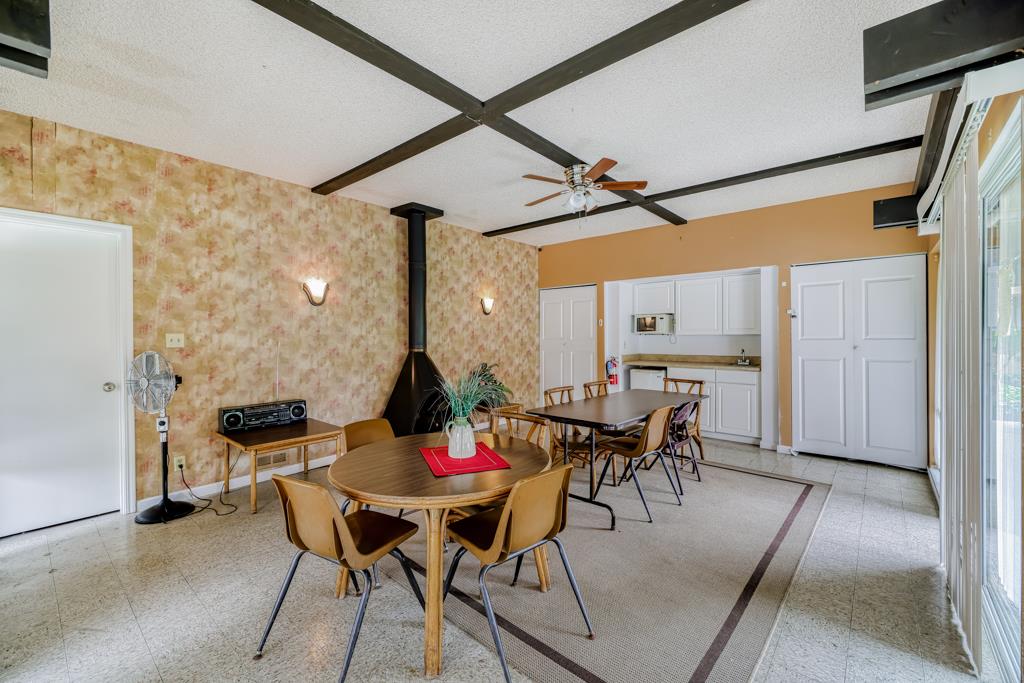 38455 Bronson Street, Unit 322 Fremont, CA 94536 - Photo 35 of 35 a view of a dining room with furniture and a window