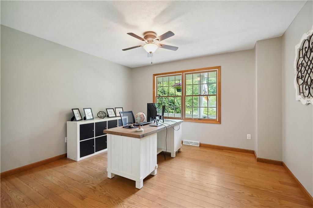 565 Leeper Road Georgetown, PA 15043 - Photo 15 of 46 a view of workspace with wooden floor and windows
