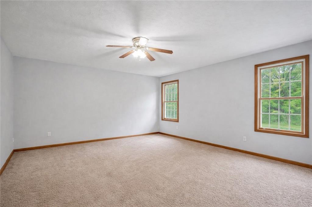 565 Leeper Road Georgetown, PA 15043 - Photo 18 of 46 an empty room with windows and fan