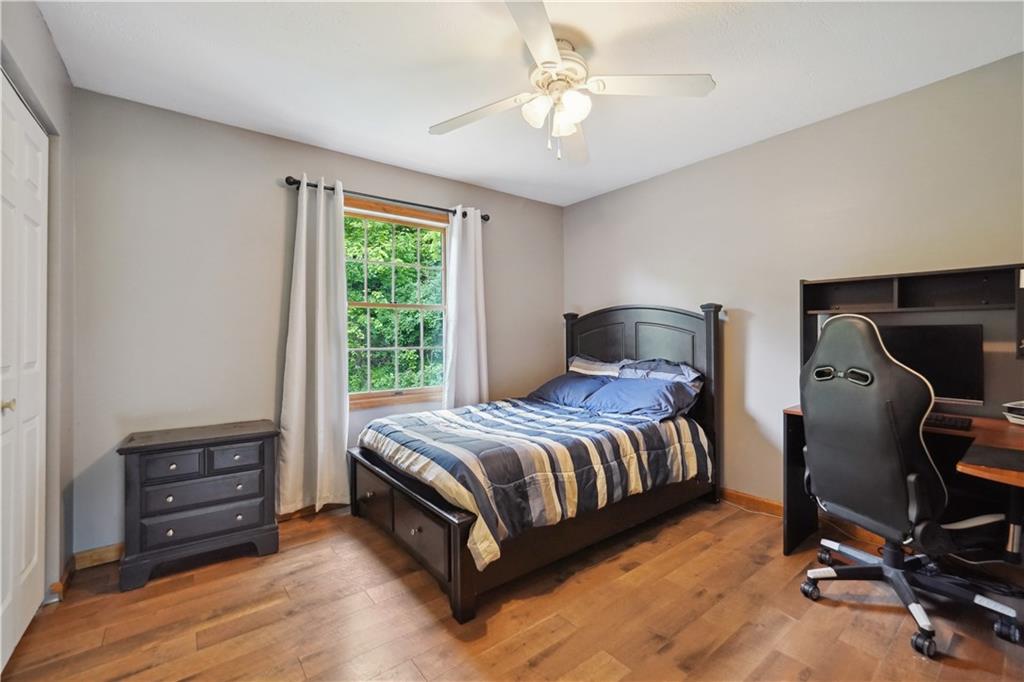 565 Leeper Road Georgetown, PA 15043 - Photo 25 of 46 a bedroom with a bed chair and window