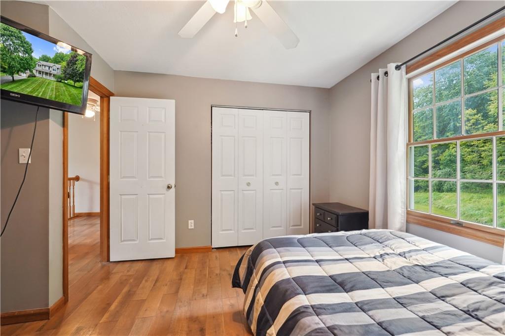 565 Leeper Road Georgetown, PA 15043 - Photo 26 of 46 a bedroom with a bed and a large window