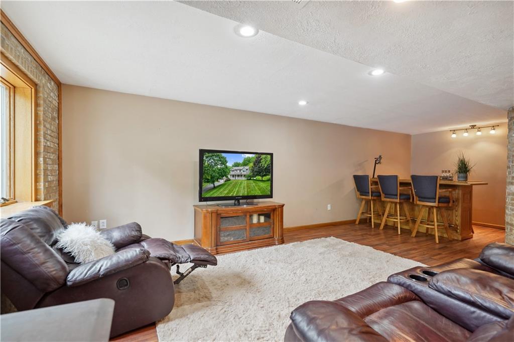 565 Leeper Road Georgetown, PA 15043 - Photo 29 of 46 a living room with furniture and a flat screen tv