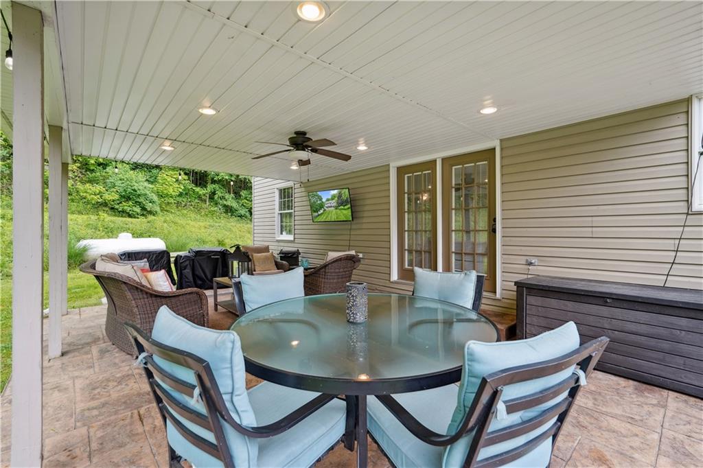 565 Leeper Road Georgetown, PA 15043 - Photo 37 of 46 a view of a dining room with furniture window and outside view