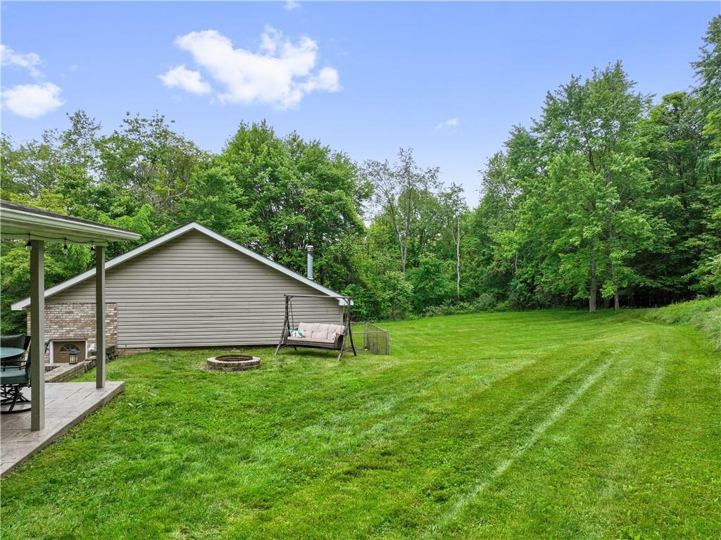 565 Leeper Road Georgetown, PA 15043 - Photo 38 of 46 a view of a backyard with a large tree