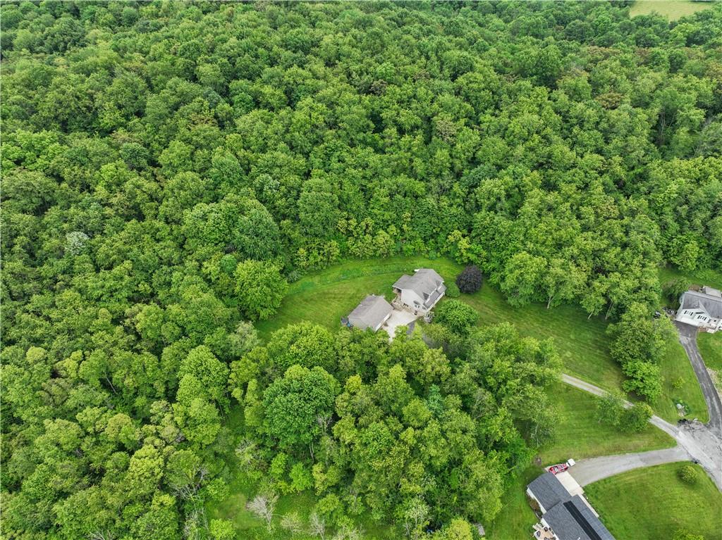 565 Leeper Road Georgetown, PA 15043 - Photo 40 of 46 a backyard of a house with a yard and outdoor seating