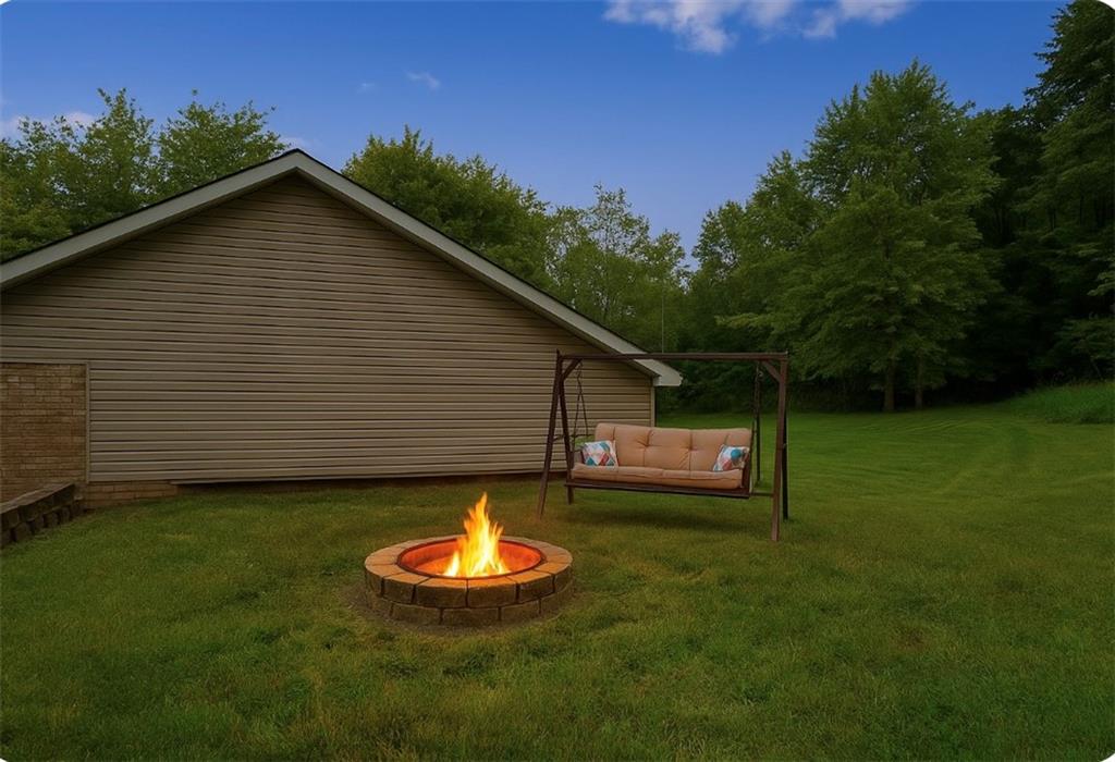 565 Leeper Road Georgetown, PA 15043 - Photo 46 of 46 a view of a small house with a yard