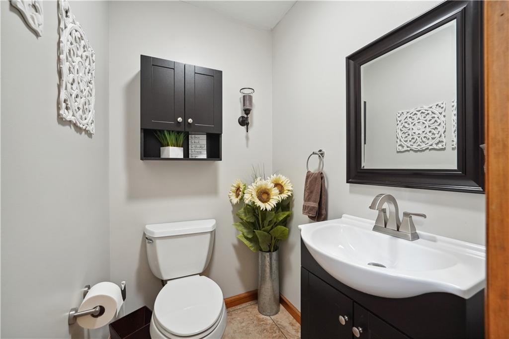 565 Leeper Road Georgetown, PA 15043 - Photo 5 of 46 a bathroom with a toilet sink and mirror