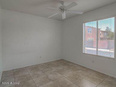 3248 West Treece Place Tucson, AZ 85742 - Photo 12 of 17 an empty room with a window
