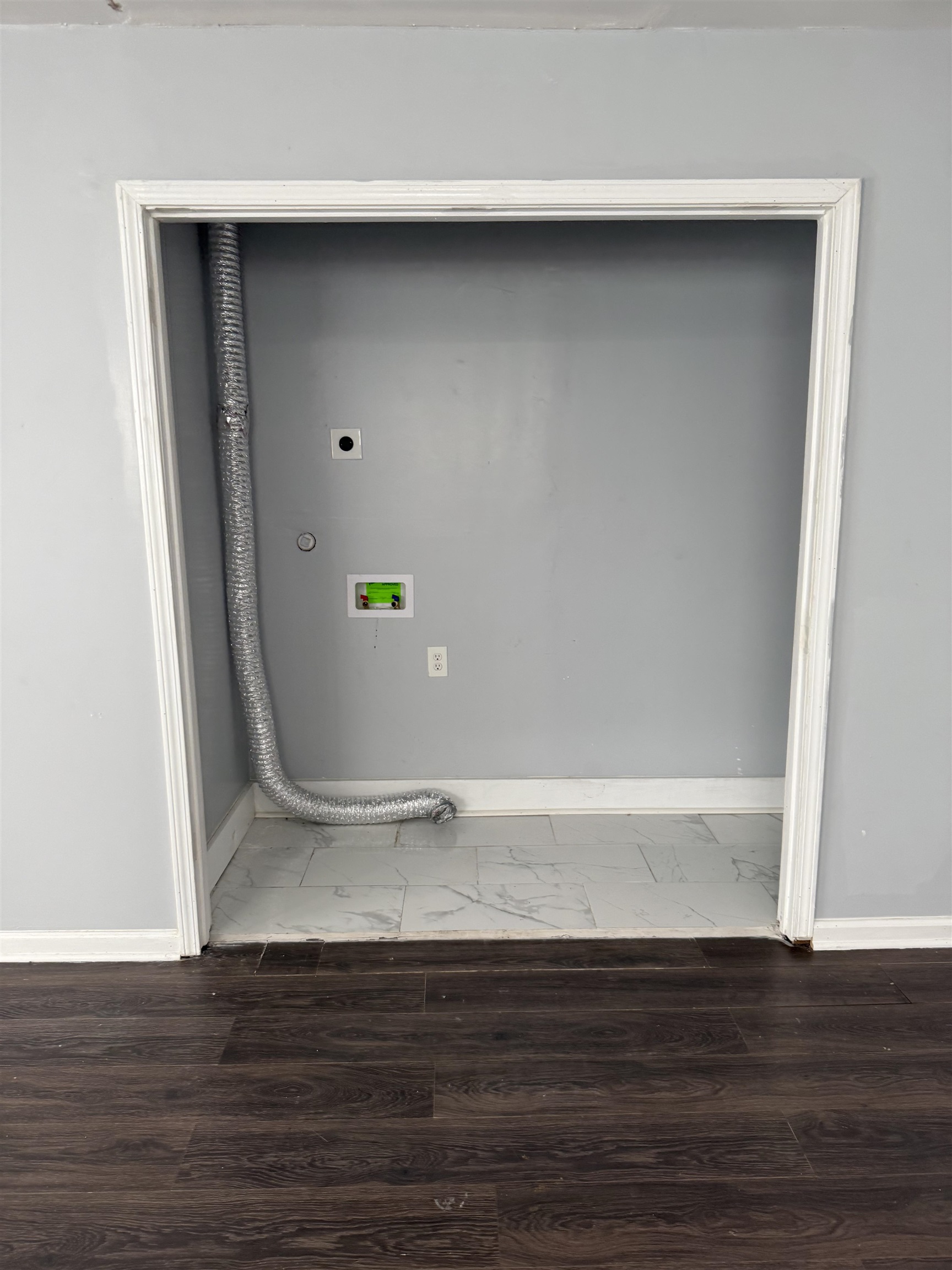 710 Hudson Street Memphis, TN 38112 - Photo 10 of 11 a view of an empty room with wooden floor