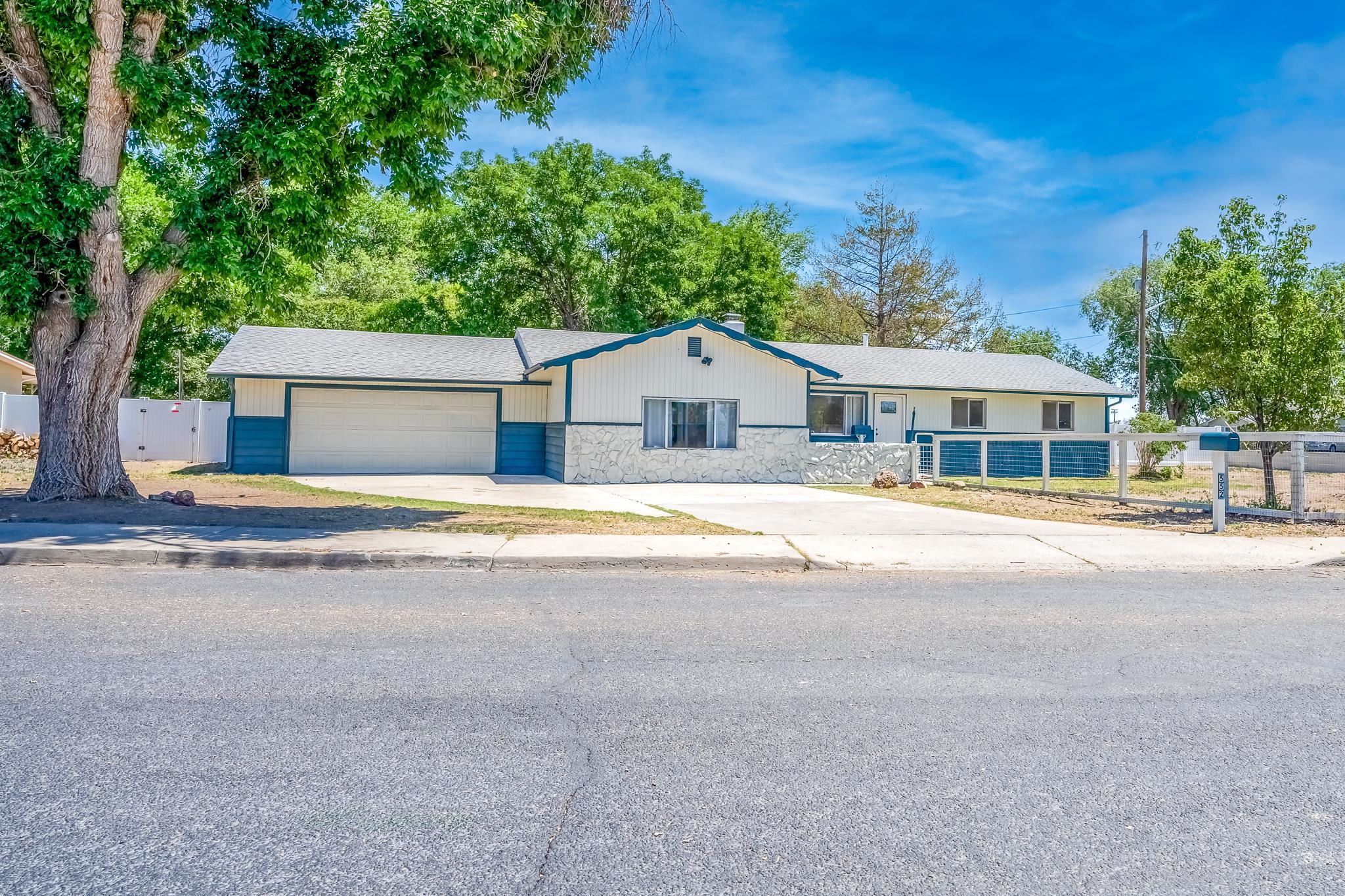 a house with swimming pool in front of it