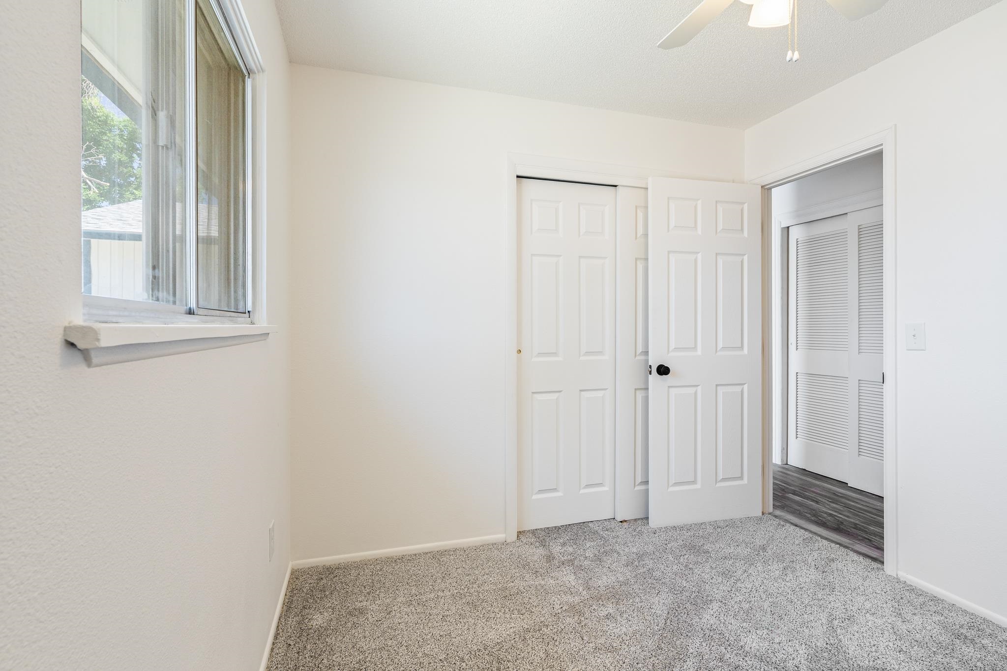 552 Normandy Drive Grand Junction, CO 81501 - Photo 15 of 23 an empty room with windows and closet