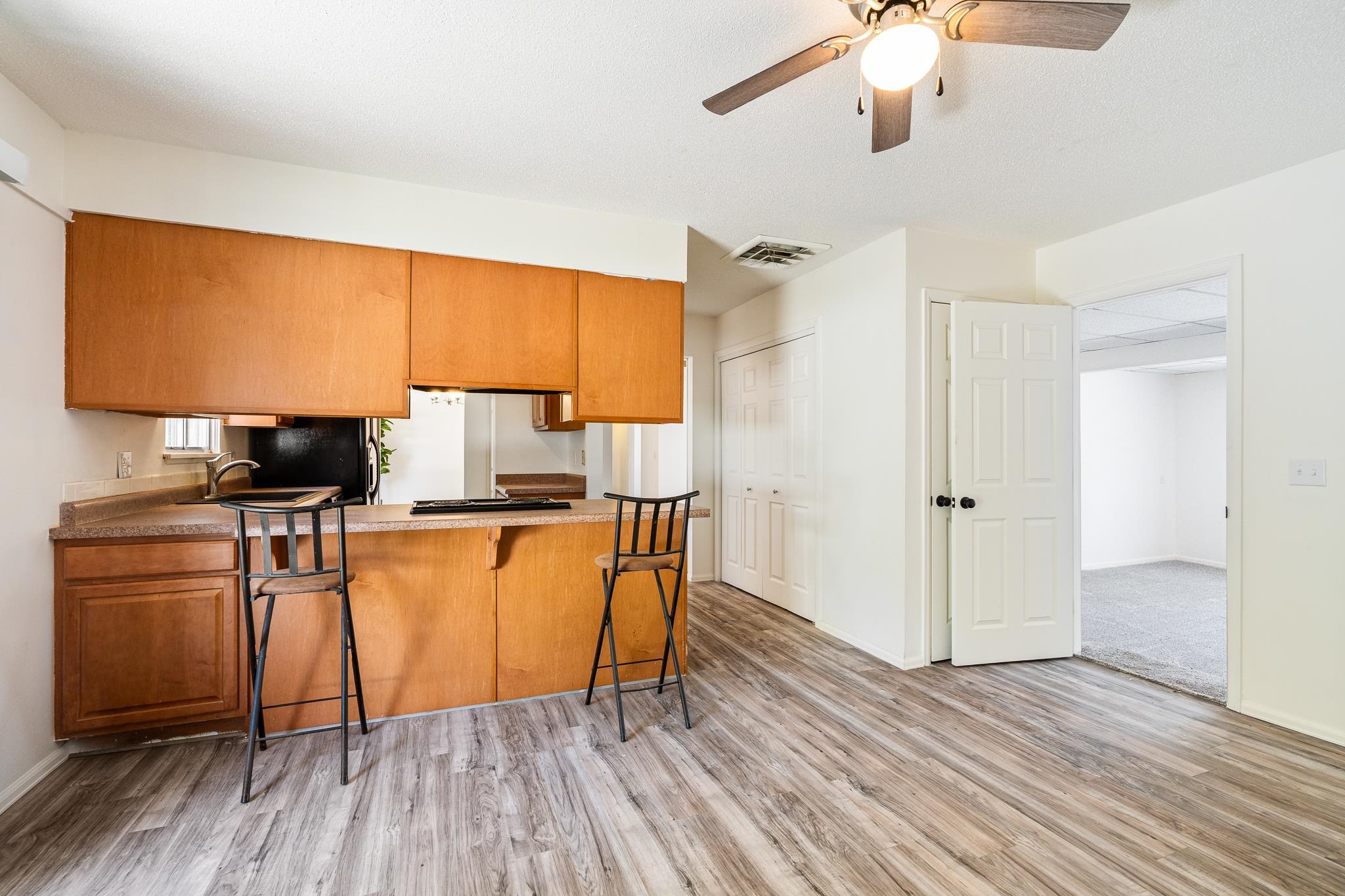 552 Normandy Drive Grand Junction, CO 81501 - Photo 8 of 23 a kitchen with stainless steel appliances a stove top oven a sink dishwasher and a refrigerator