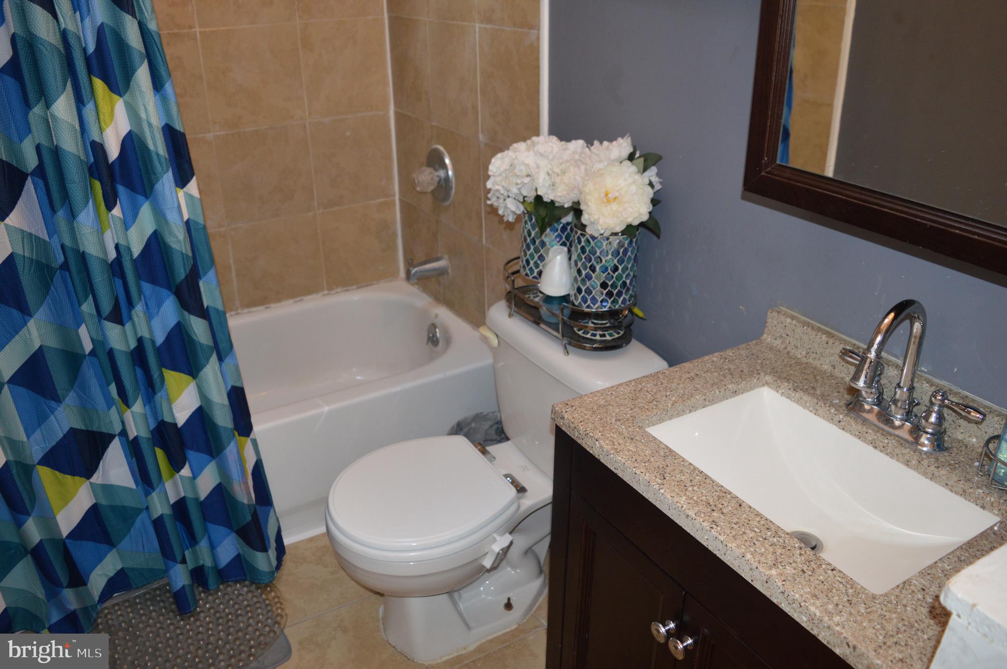 7017 Radbourne Road Upper Darby, PA 19082 - Photo 14 of 26 3 piece Hall Bath