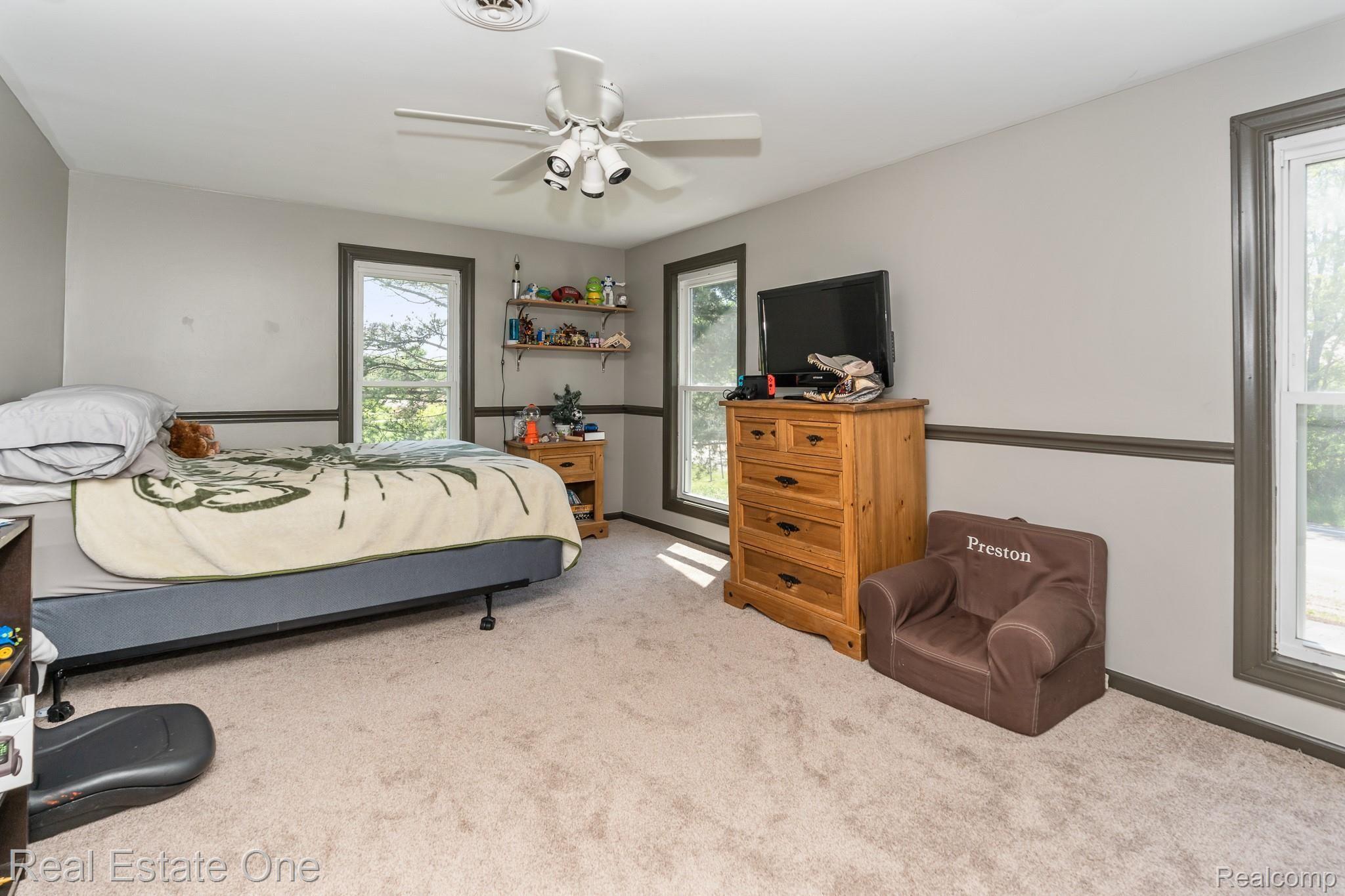 8047 Perry Road Grand Blanc, MI 48439 - Photo 36 of 48 Bedroom 1 upstairs: New carpet, paint, doors and handles 2019.