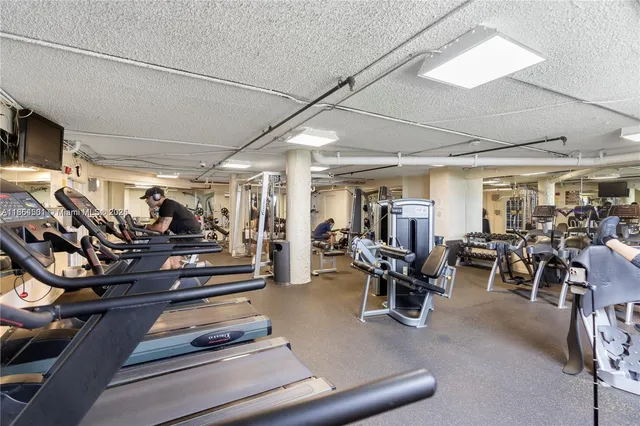 a aerial view of a house with table and chairs