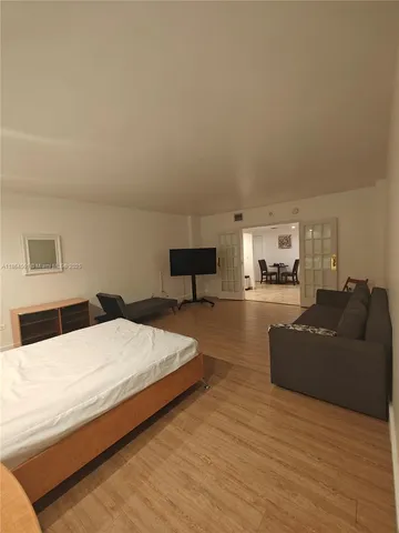 a bedroom with furniture and a couch