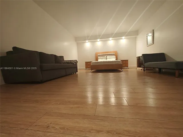 a bathroom with a glass door shower