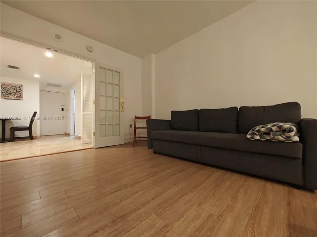 a bathroom with a toilet a sink and bathtub