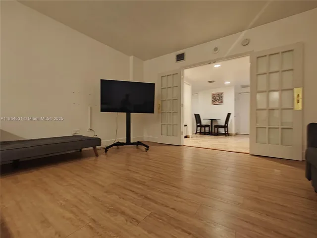 a living room with furniture and a couch
