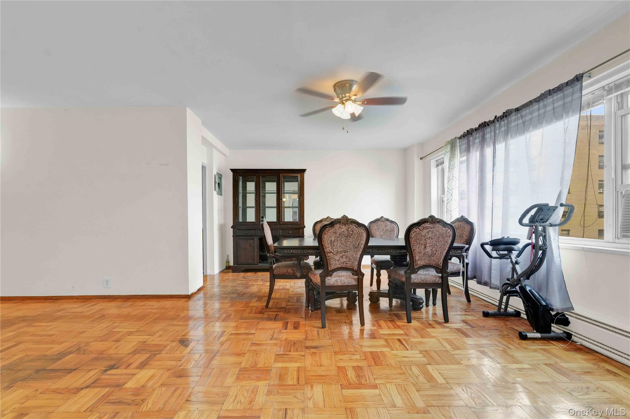 6 Fordham Hill Ovl, Unit 11G Bronx, NY 10468 - Photo 7 of 26 a view of a dining room with furniture