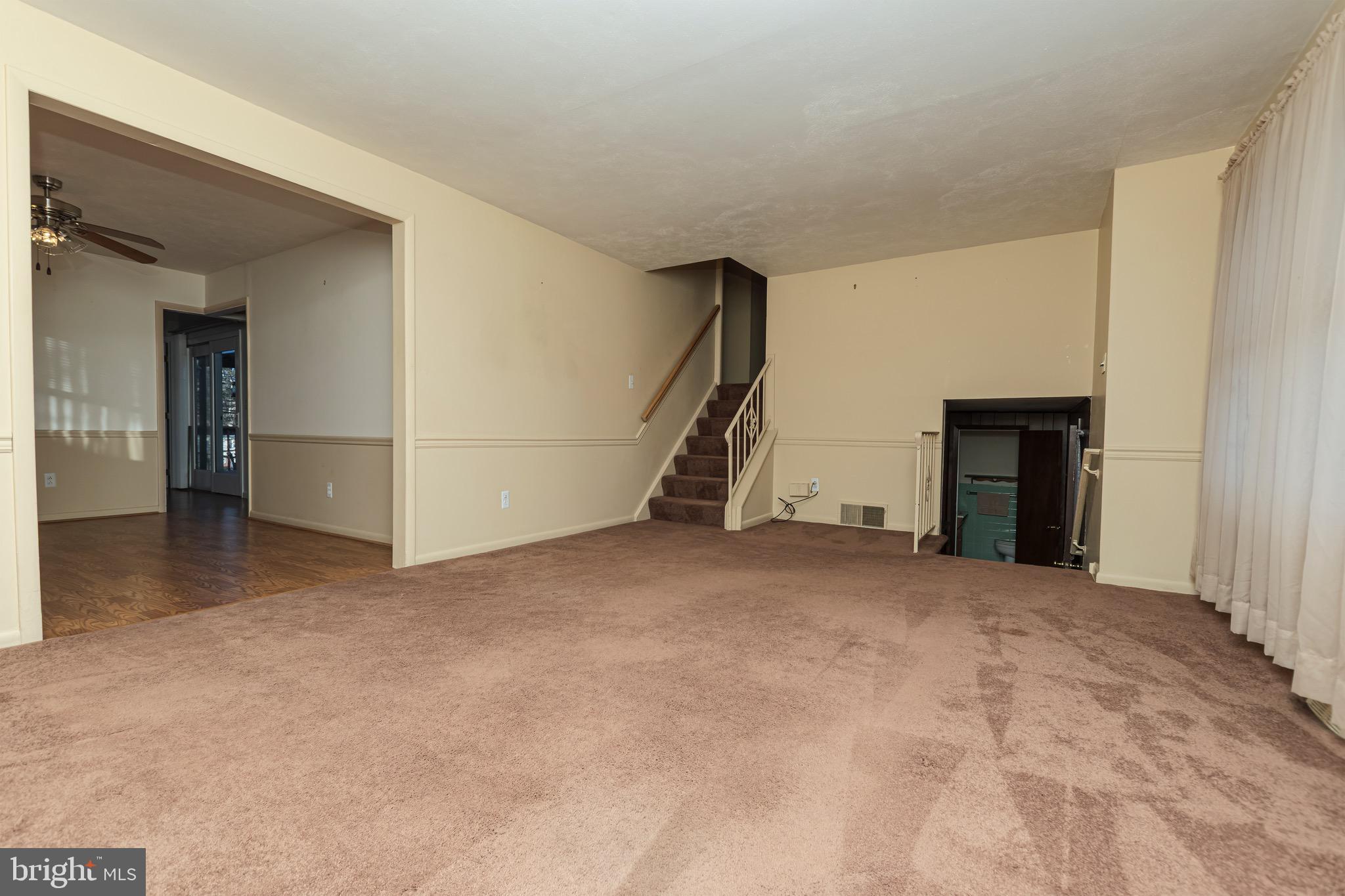 16 Pinedale Road Newark, DE 19711 - Photo 13 of 55 a view of an empty room with a fireplace