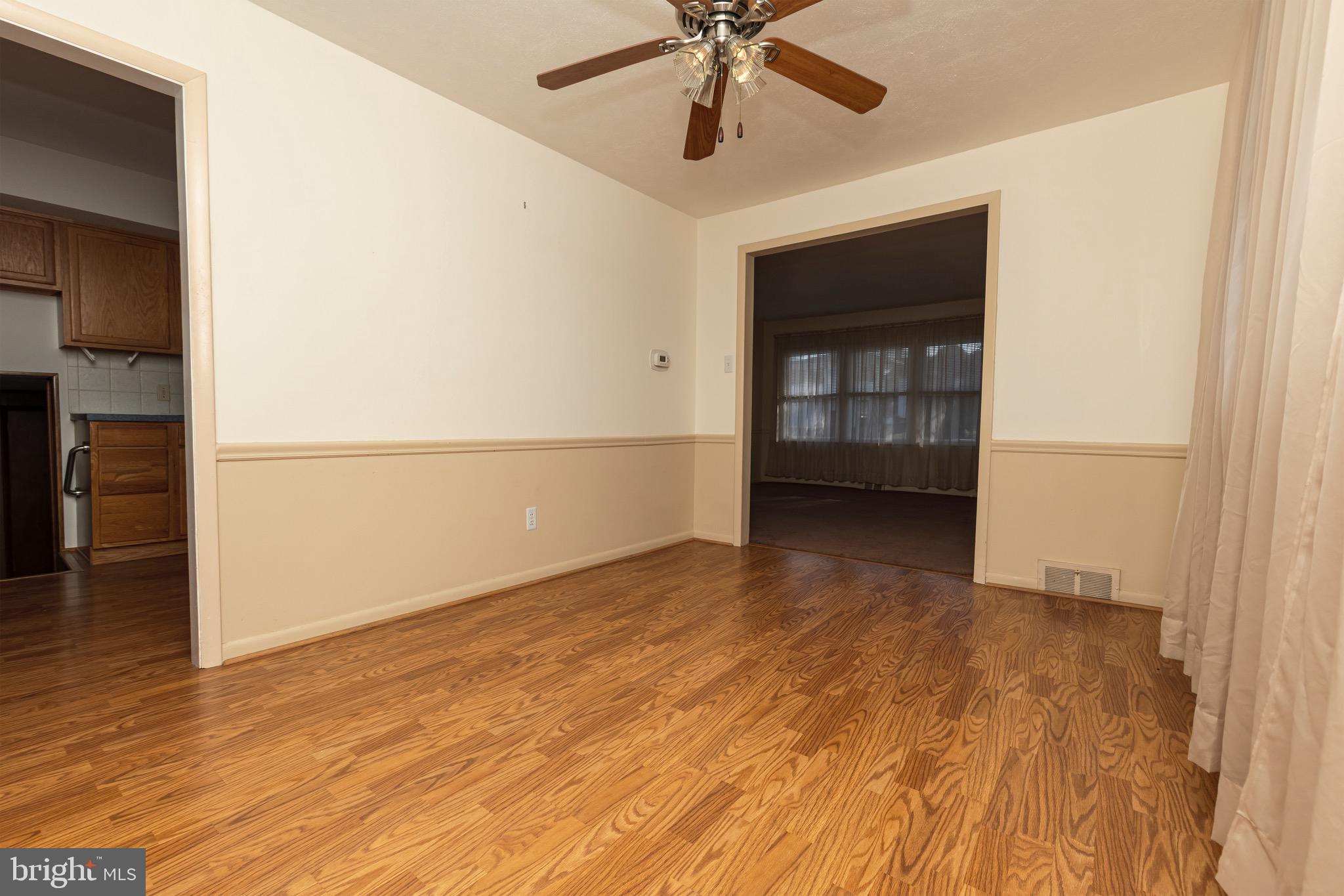 16 Pinedale Road Newark, DE 19711 - Photo 16 of 55 an empty room with wooden floor closet and windows