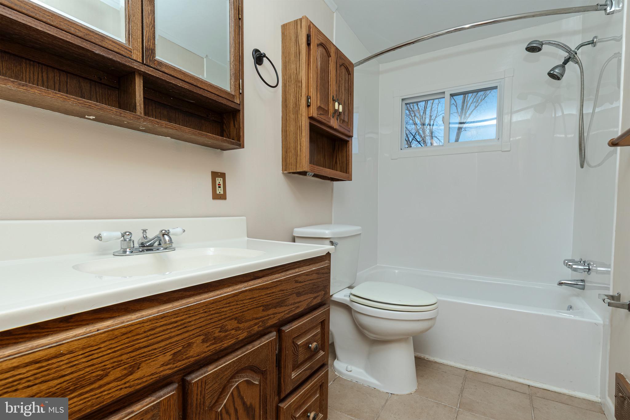 16 Pinedale Road Newark, DE 19711 - Photo 33 of 55 a bathroom with a granite countertop toilet sink and mirror