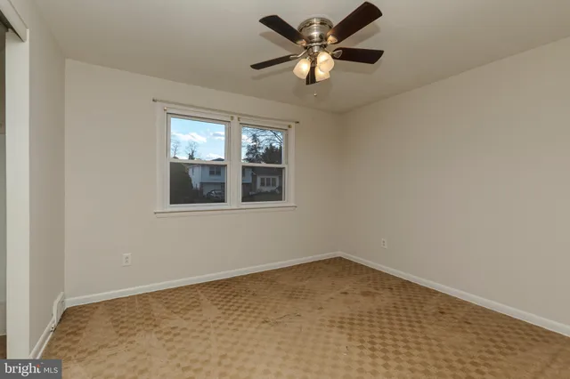 a view of a balcony with wooden floor