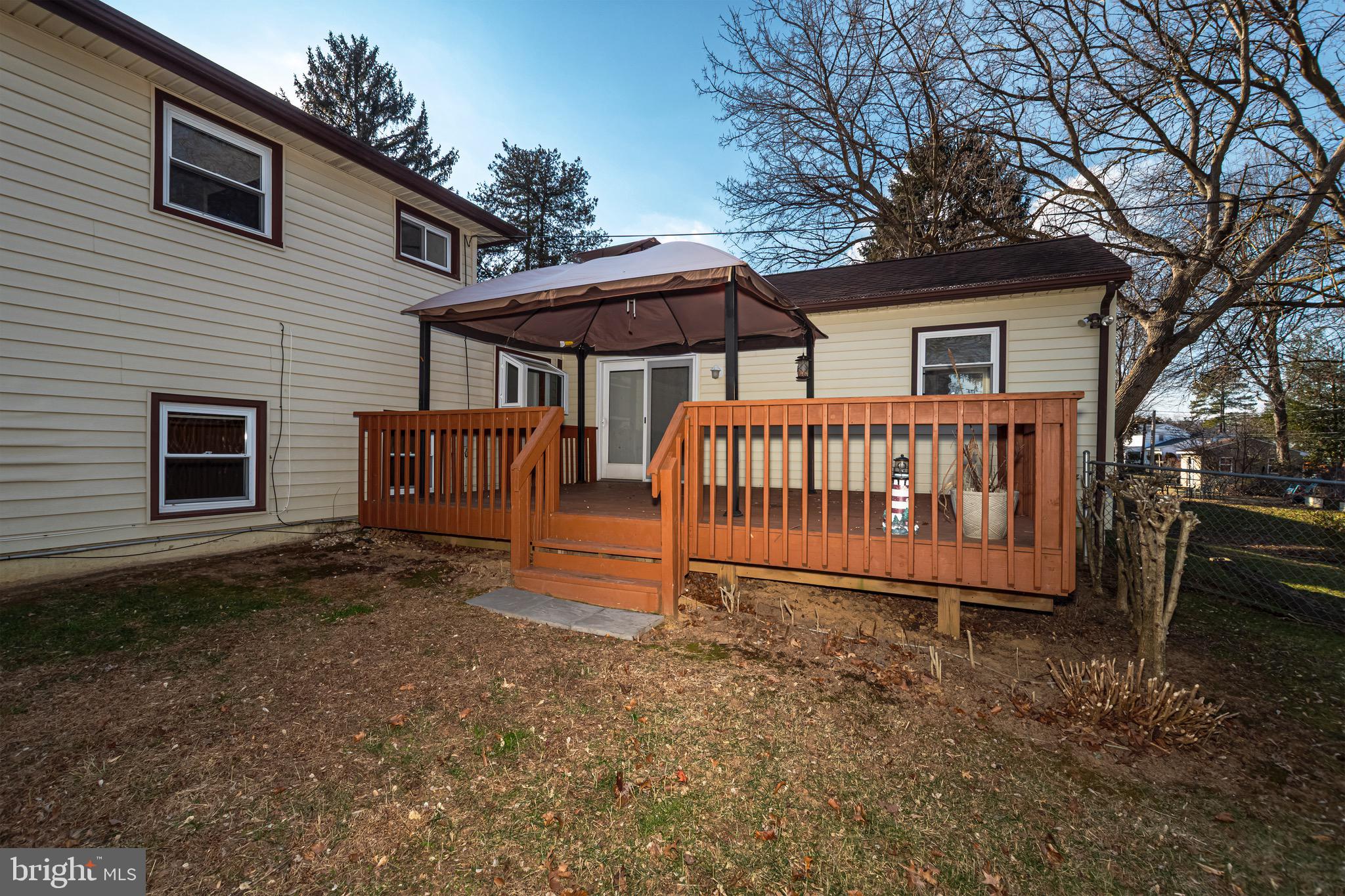 16 Pinedale Road Newark, DE 19711 - Photo 42 of 55 a view of backyard with a deck and barbeque oven