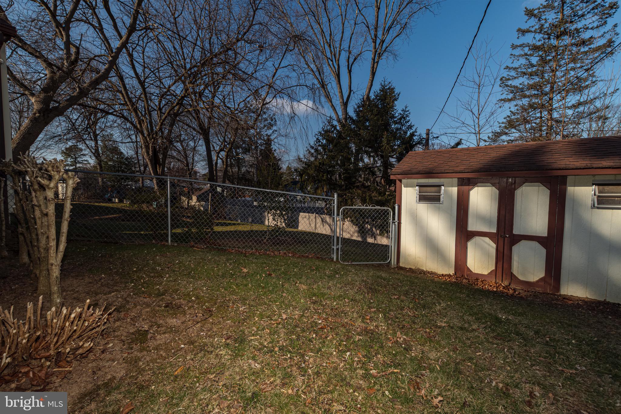 16 Pinedale Road Newark, DE 19711 - Photo 44 of 55 a view of a wooden fence with large trees