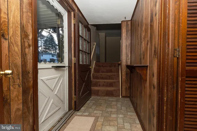 a view of an entryway with staircase