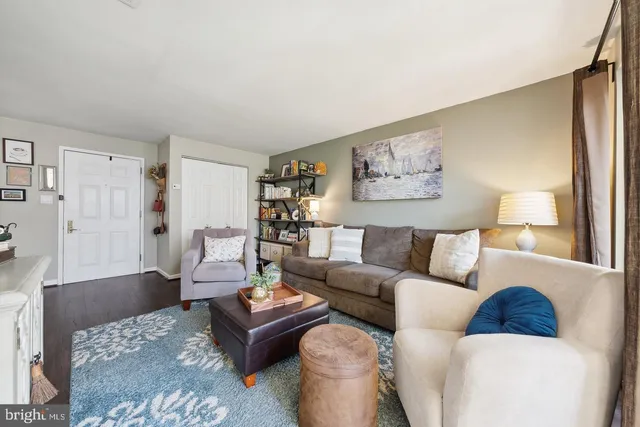 a living room with furniture and a couch