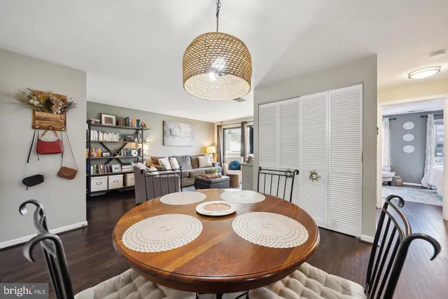 a kitchen with stainless steel appliances a refrigerator sink and cabinets
