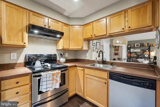 a kitchen with a stove and a microwave