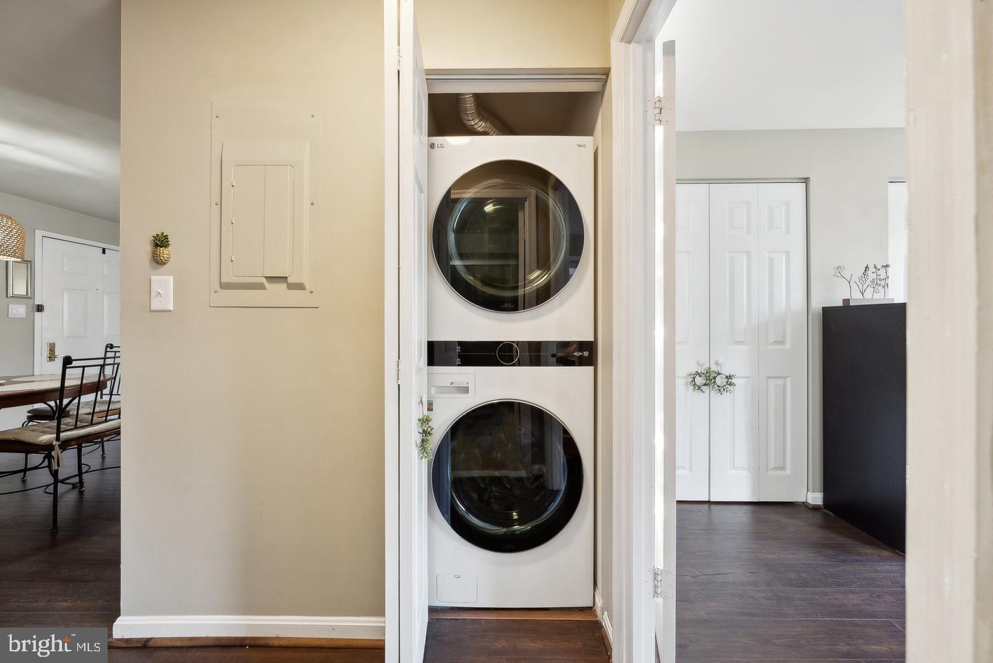 1020 North Stafford Street, Unit 311 Arlington, VA 22203 - Photo 27 of 37 a view of a hallway with washer and dryer