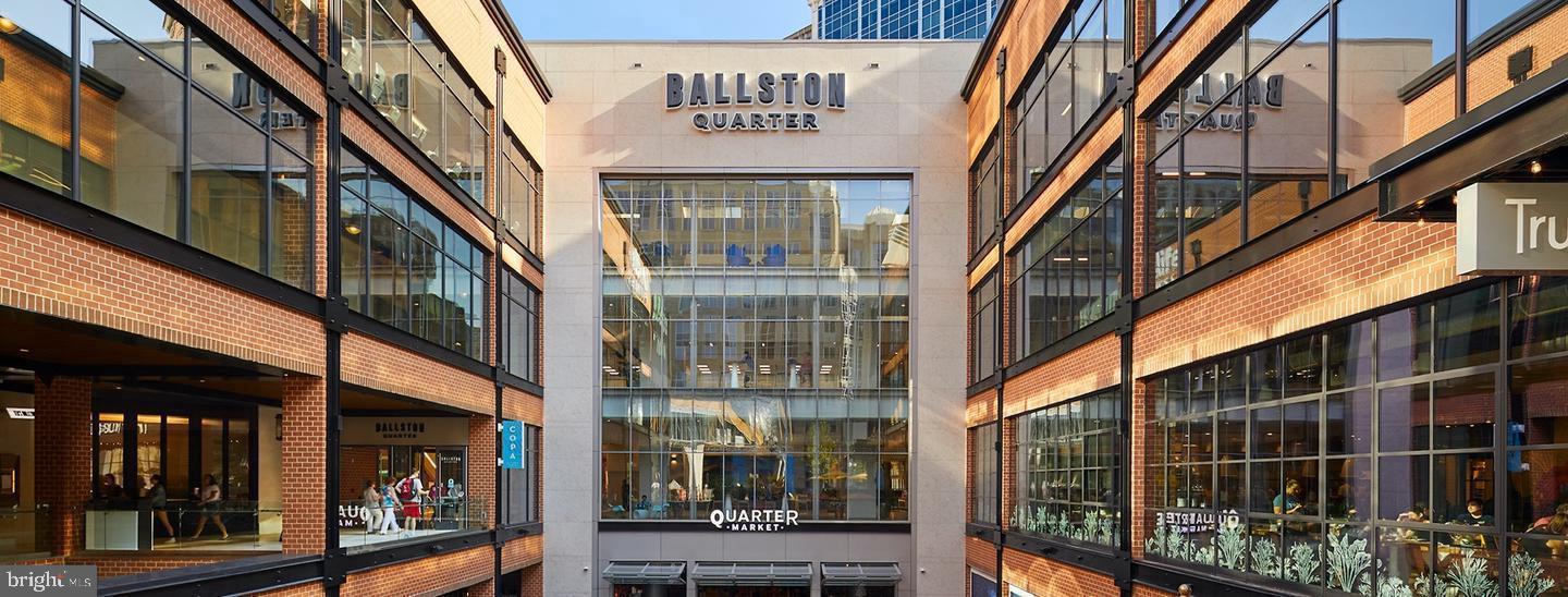 1020 North Stafford Street, Unit 311 Arlington, VA 22203 - Photo 35 of 37 a front view of a building with glass door and glass door