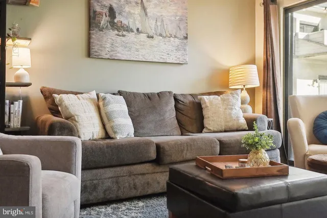 a living room with furniture and a couch