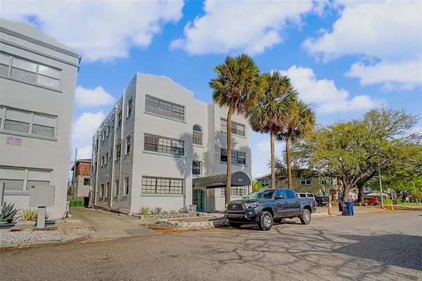 a car parked in front of a building