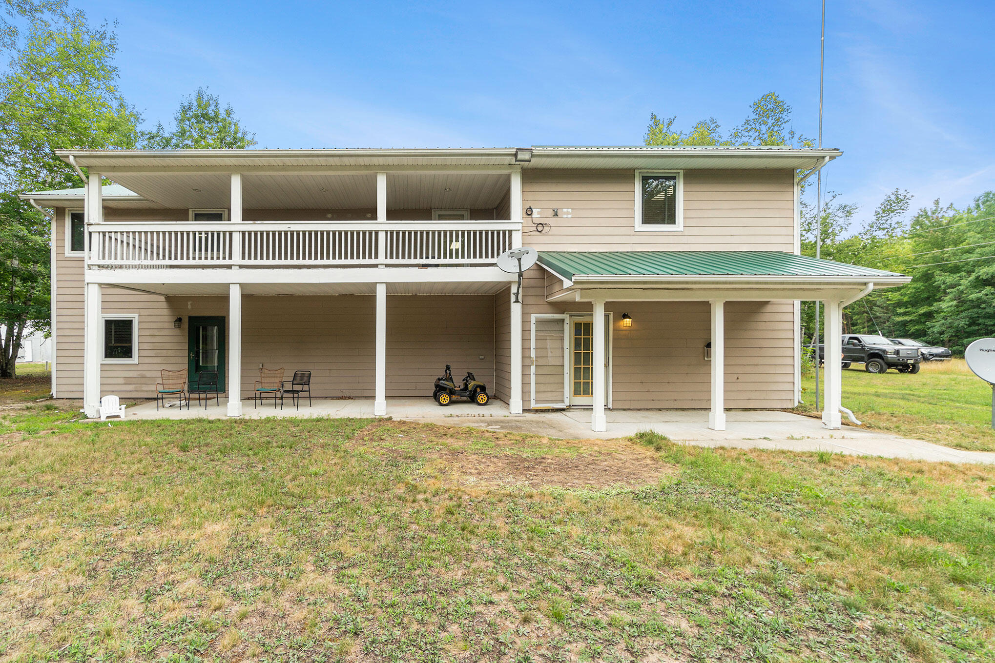 5847 West Miller Road Shepherd, MI 48883 - Photo 2 of 31 Back of House with Patio and upper deck