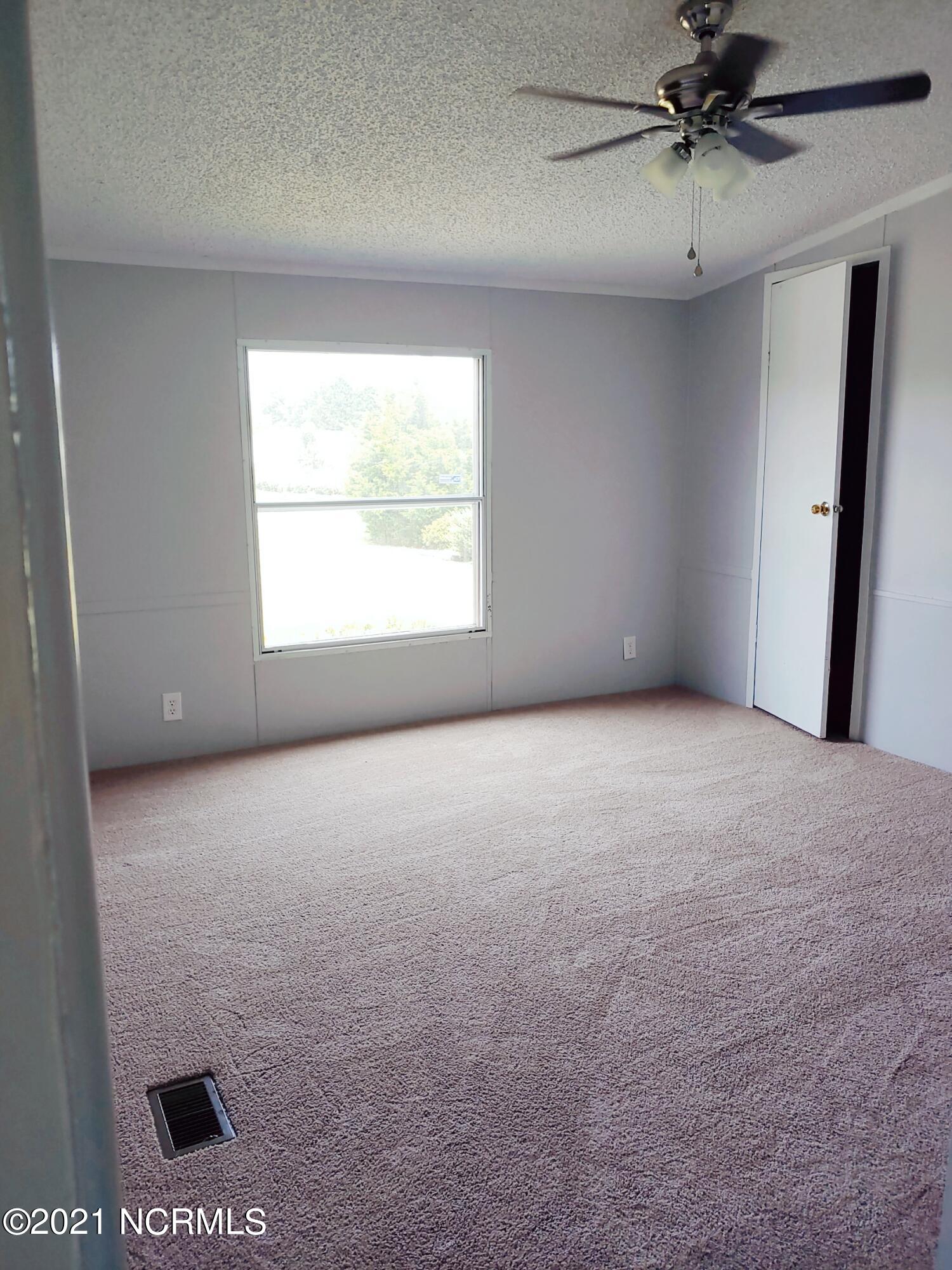 4124 Shawnee Road Wilson, NC 27893 - Photo 11 of 14 11 - Hall Bed 1