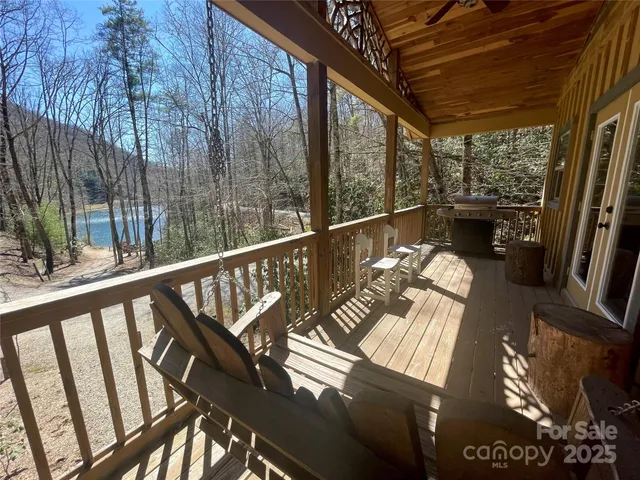 a view of balcony with furniture