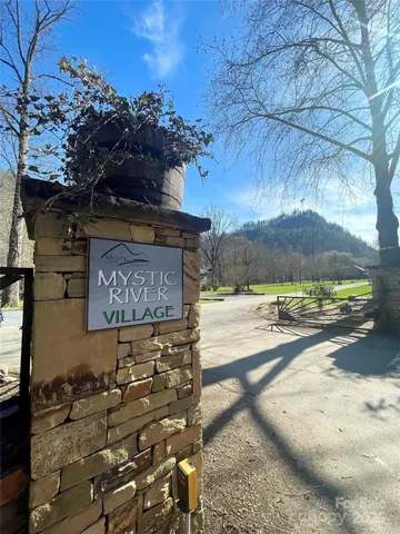 a view of a street with a building in the background