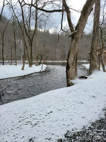 a view of a yard with snow